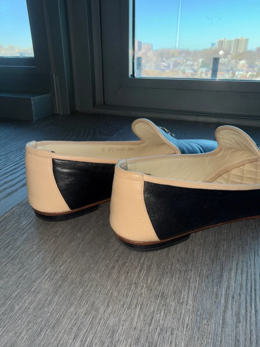 CHANEL Black Leather Slip-On Loafers with Cream Trim and Gold CC - Picture 5 of 9